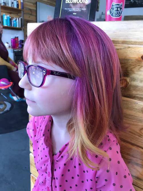 Hair Extensions photo, Denver Colorado. This sweet girl wanted rainbow hair, but with a twist the co(..)